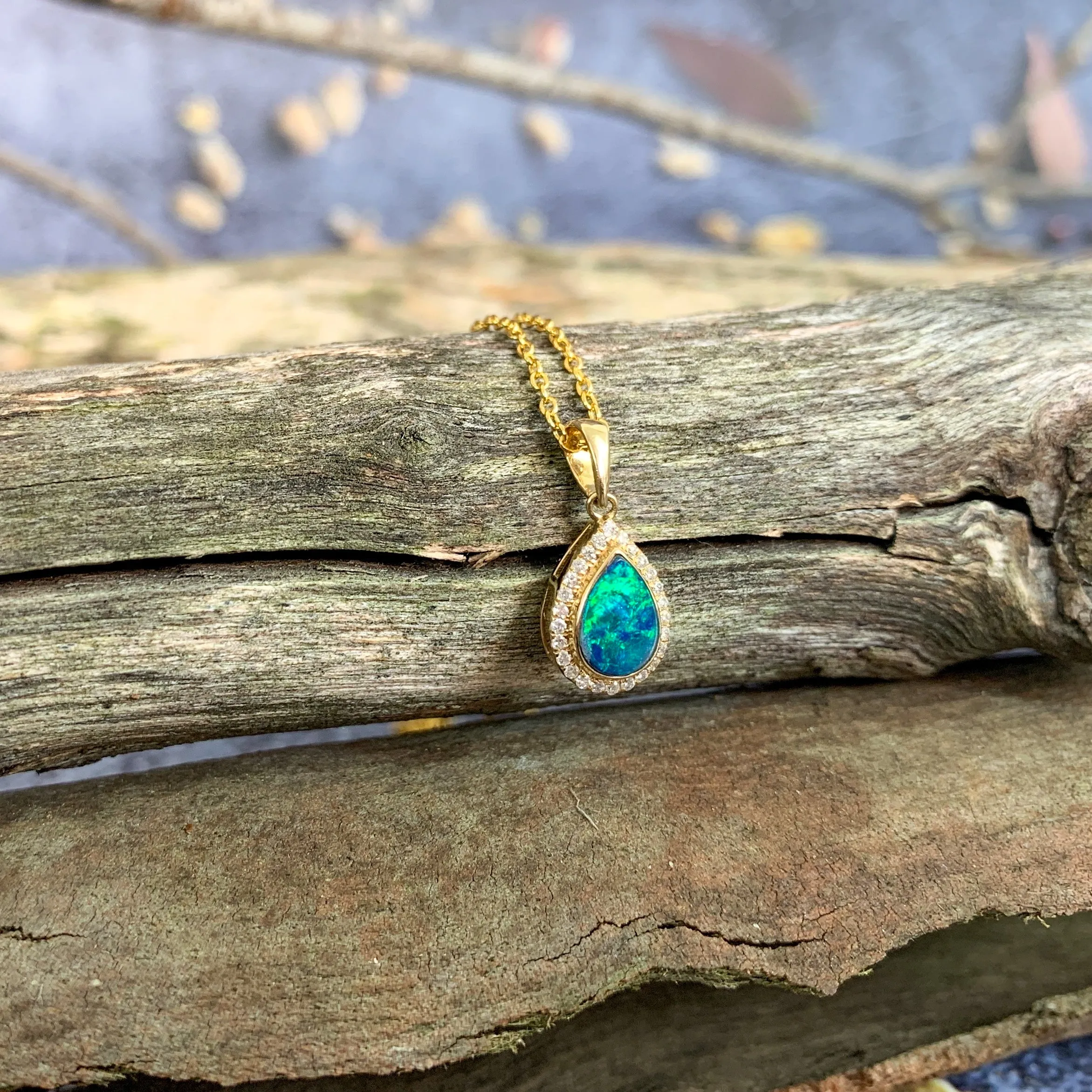 14kt Yellow Gold pearshape Opal doublet halo pendant