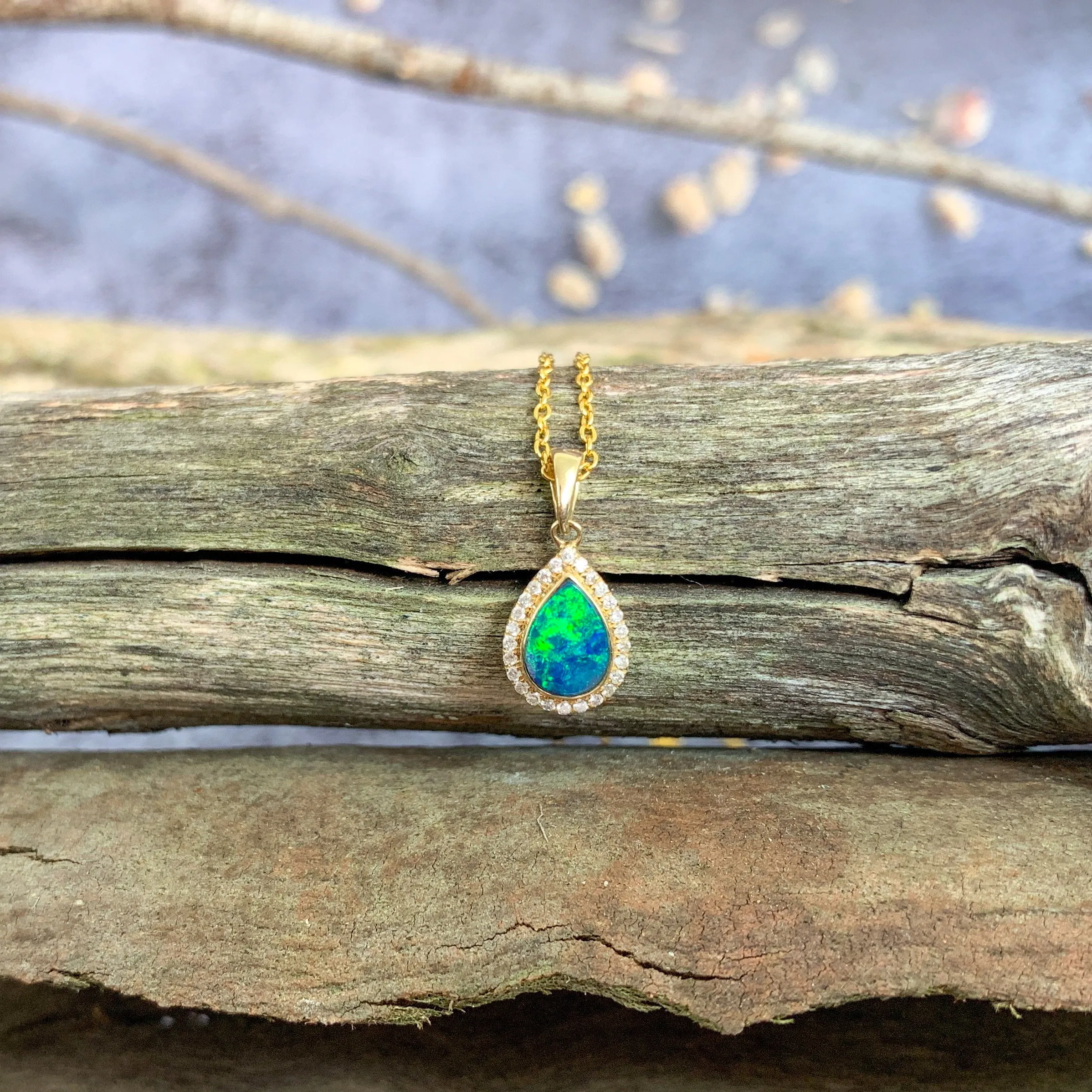 14kt Yellow Gold pearshape Opal doublet halo pendant