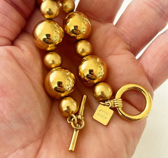 80s signed Ann Klein shiny gold metal beaded necklace.