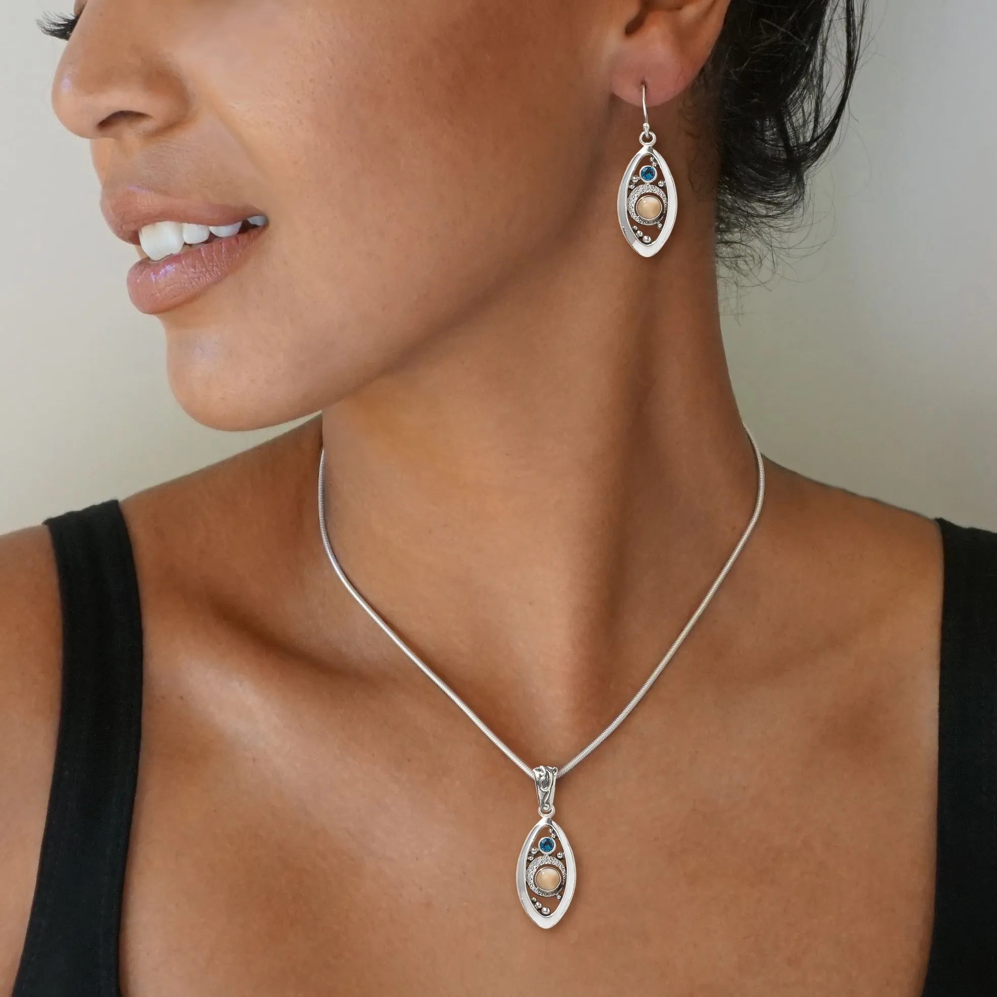 BLUE TOPAZ AND FOSSILIZED WALRUS IVORY EARRINGS – MICROCOSM