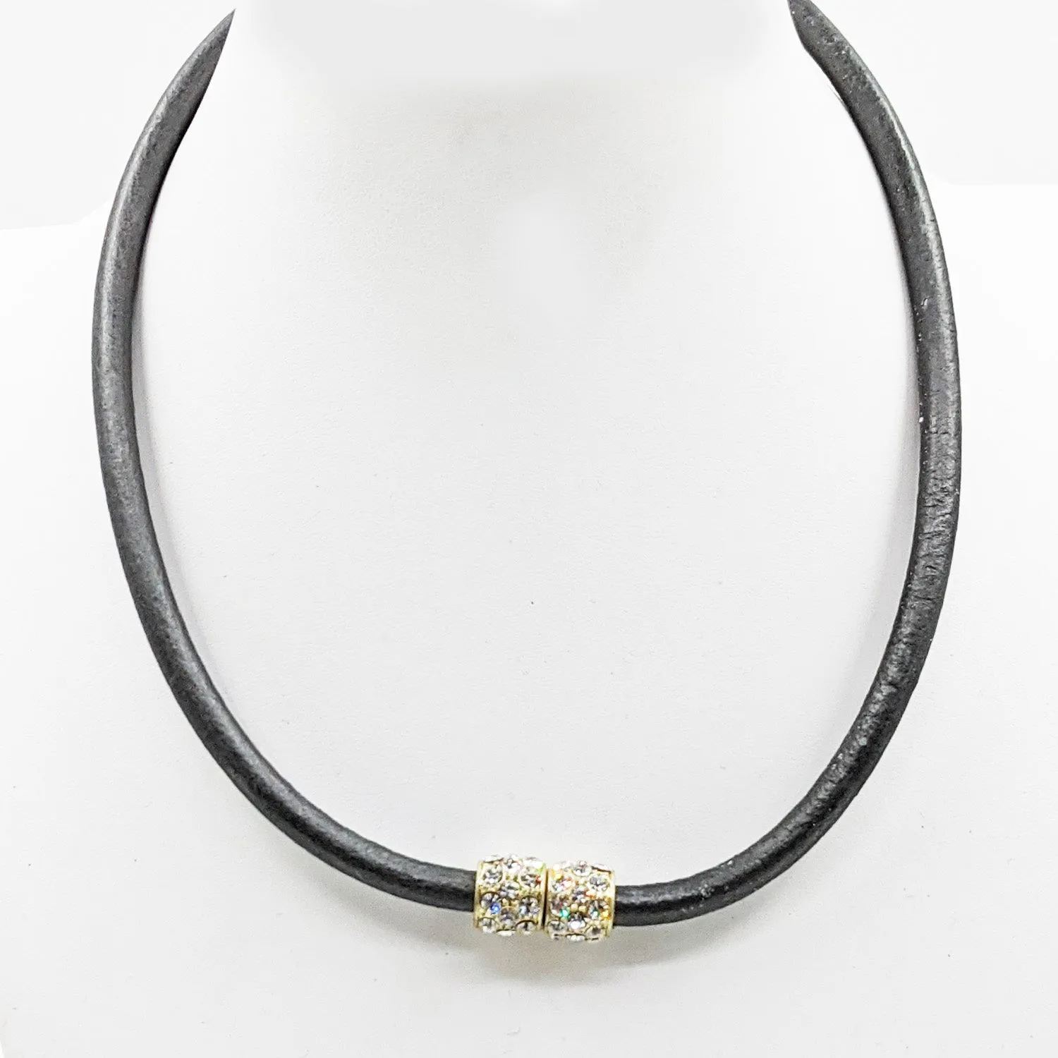 Delicate leather stranded necklace with diamante top feature