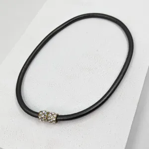 Delicate leather stranded necklace with diamante top feature