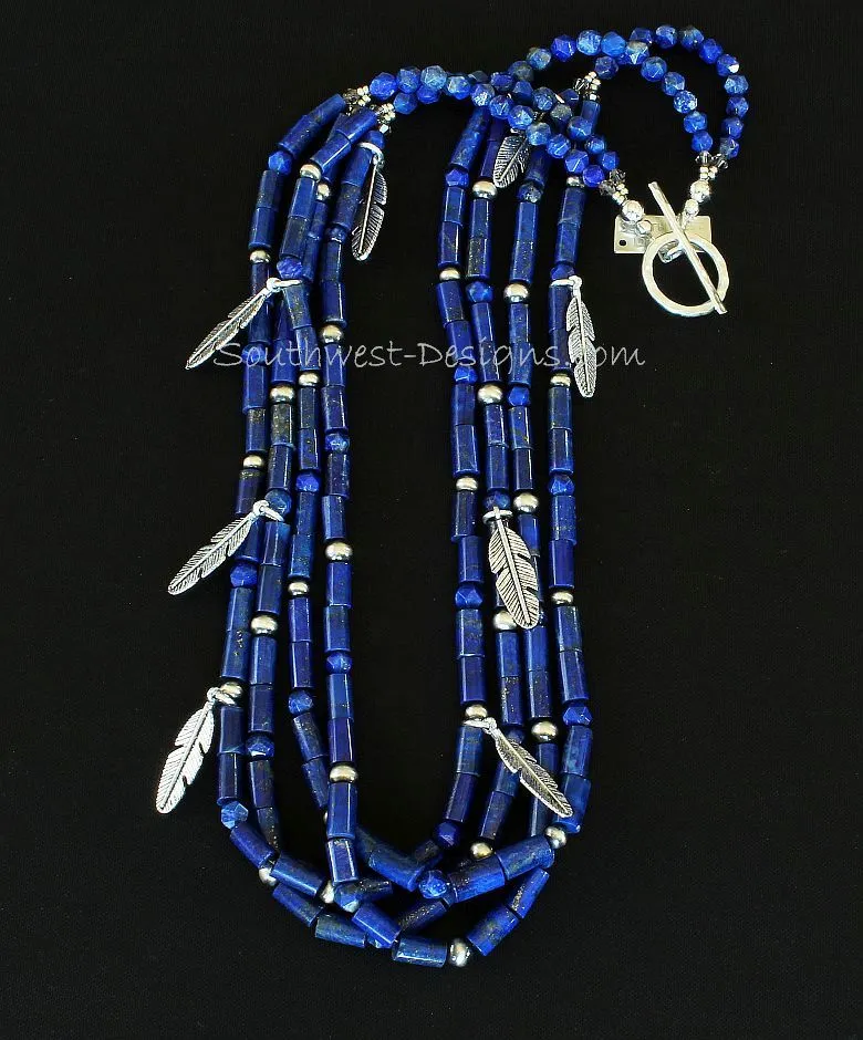 Lapis Lazuli Cylinder Bead 4-Strand Necklace with Lapis Faceted Rounds, Sterling Silver Oxidized Rounds, Sterling Feather Charms, and Hammered Sterling Silver Toggle Clasp