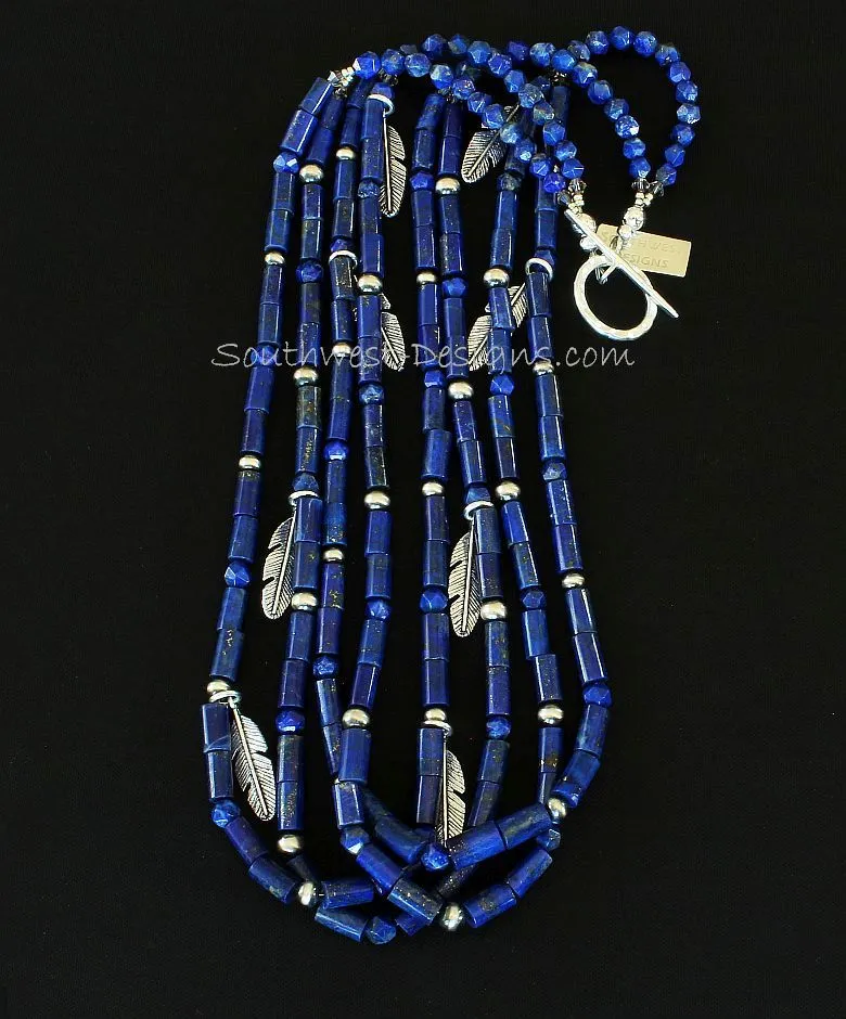 Lapis Lazuli Cylinder Bead 4-Strand Necklace with Lapis Faceted Rounds, Sterling Silver Oxidized Rounds, Sterling Feather Charms, and Hammered Sterling Silver Toggle Clasp