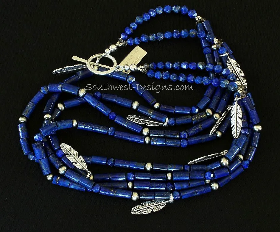 Lapis Lazuli Cylinder Bead 4-Strand Necklace with Lapis Faceted Rounds, Sterling Silver Oxidized Rounds, Sterling Feather Charms, and Hammered Sterling Silver Toggle Clasp