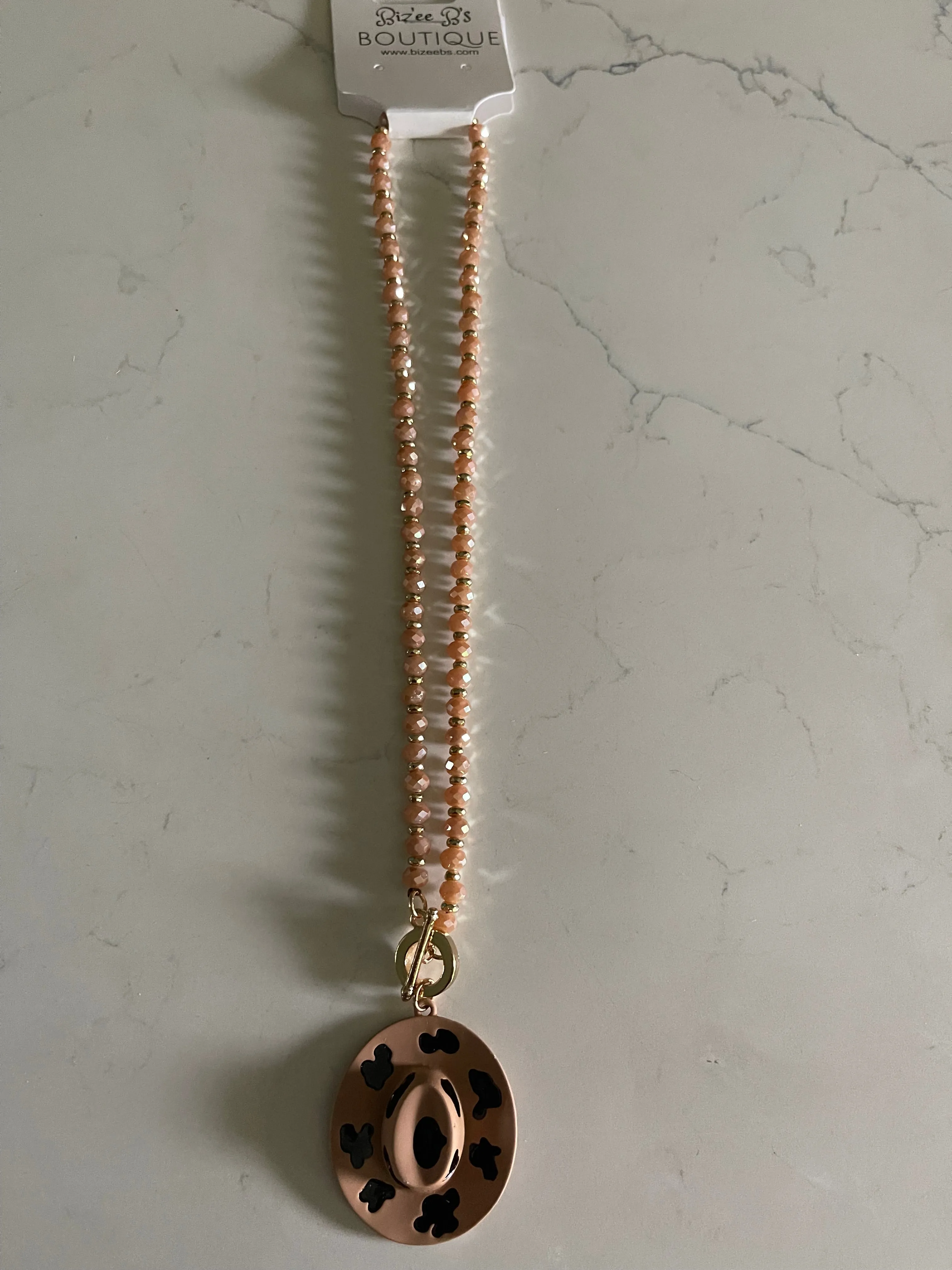 Metal Cowboy Hat with Cow Print Necklace