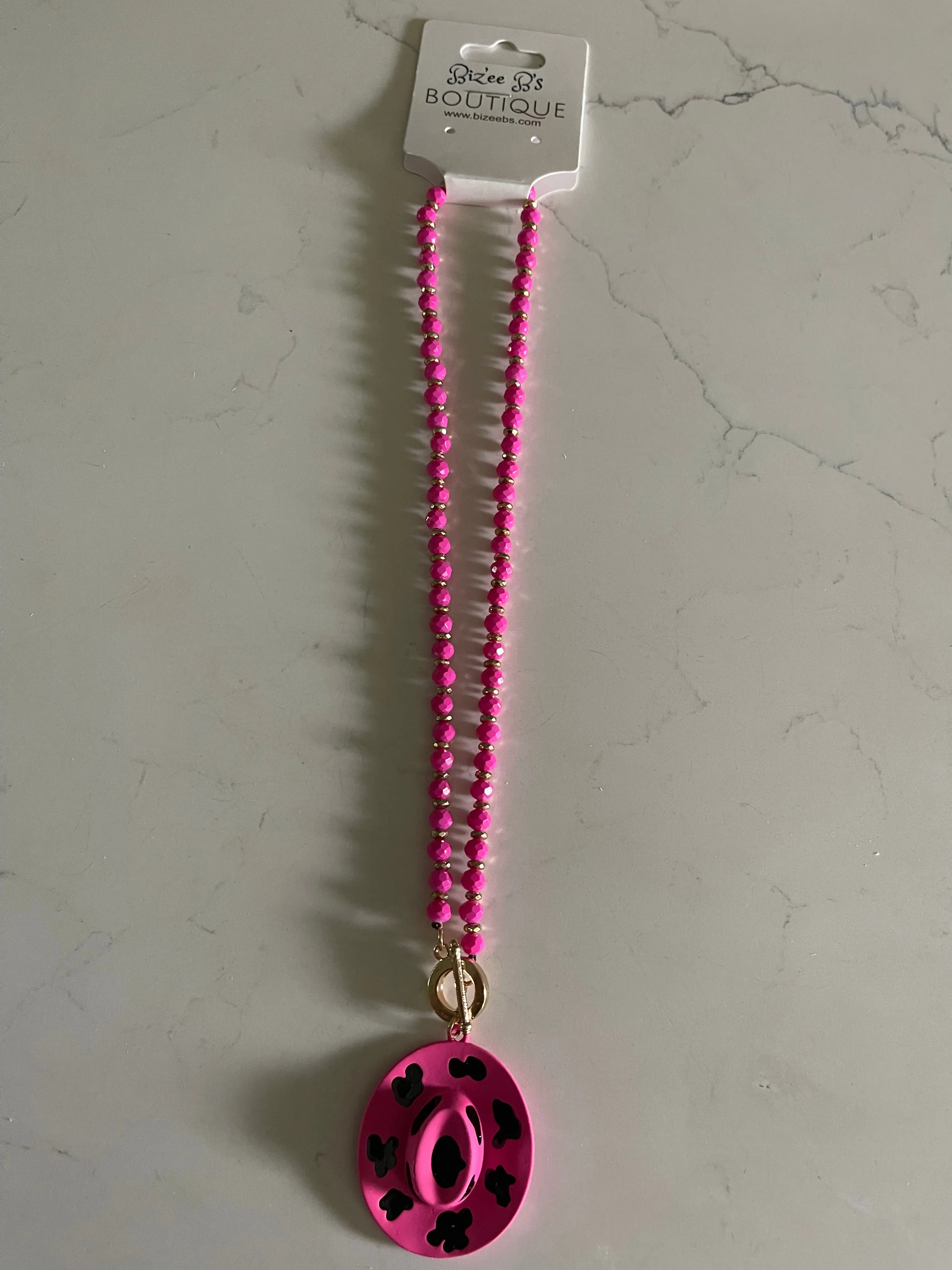 Metal Cowboy Hat with Cow Print Necklace