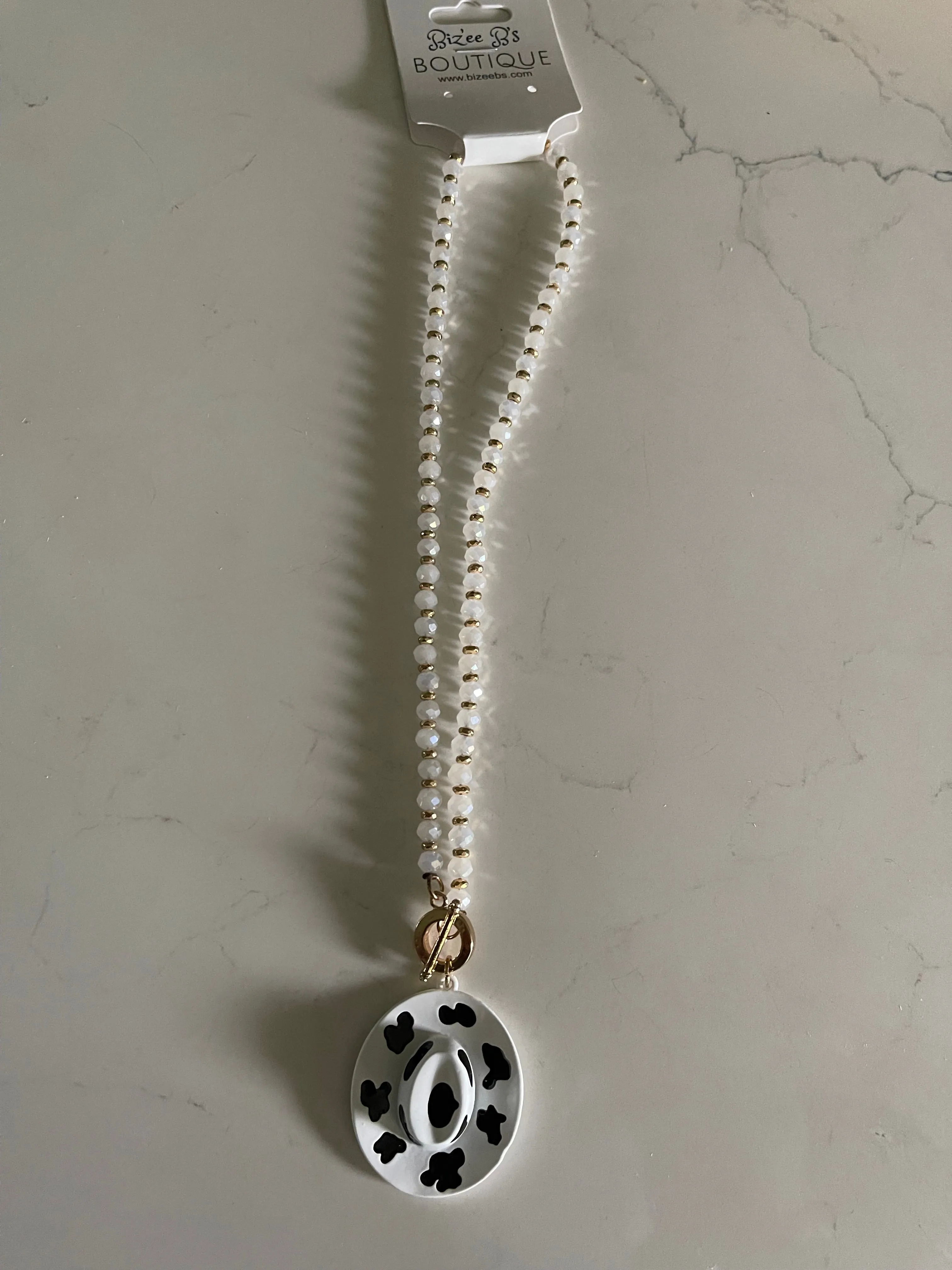 Metal Cowboy Hat with Cow Print Necklace