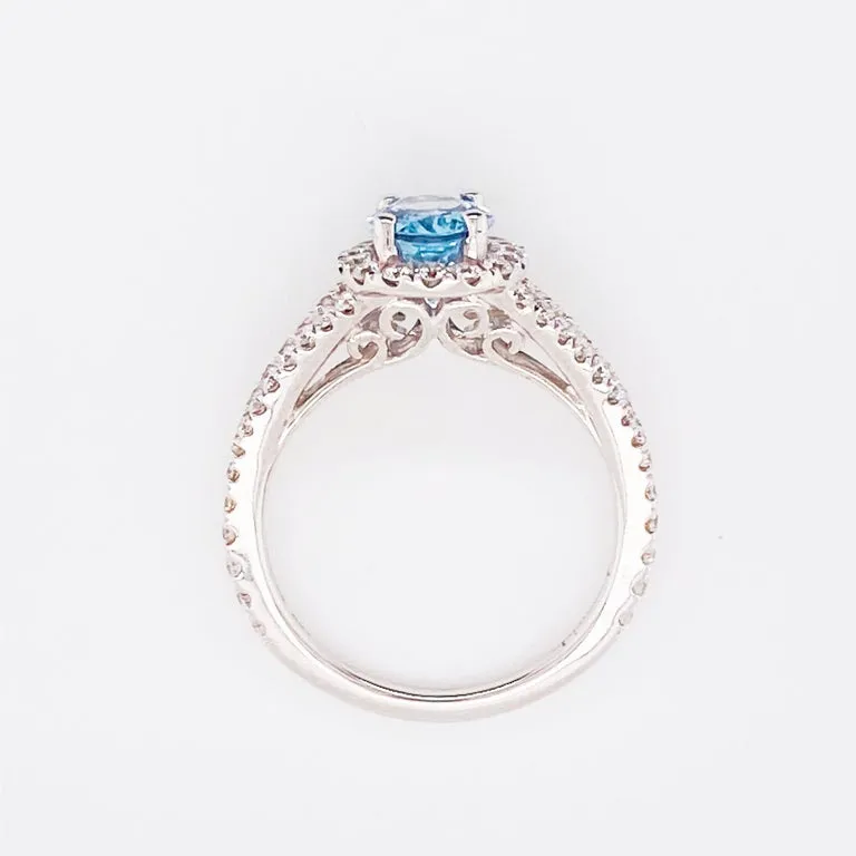 Oval Aquamarine and Diamond Halo Engagement Ring