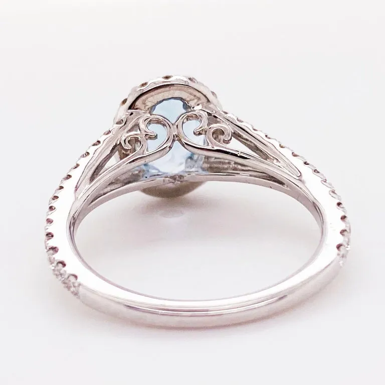 Oval Aquamarine and Diamond Halo Engagement Ring