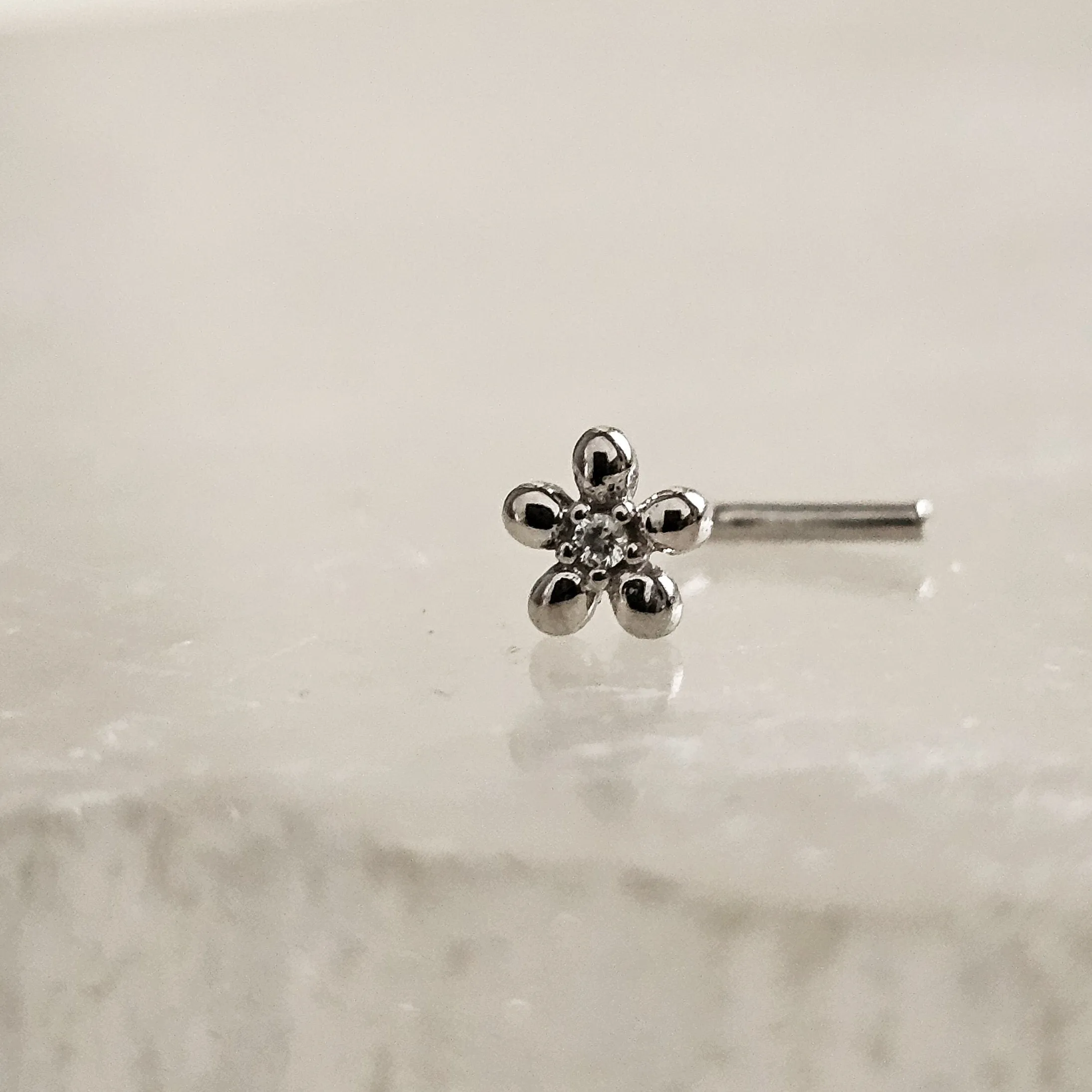 Tiny 14K Gold Flower Nose Stud With Tiny Diamond CZ Accent